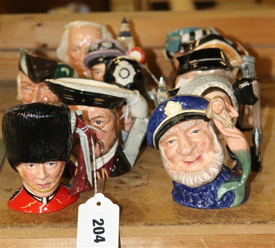 Eleven small Royal Doulton character jugs, inc. Henry VIII, The Guardsman, The Jockey, etc.